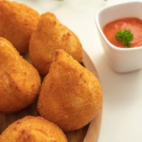 Coxinha de frango with chili sauce