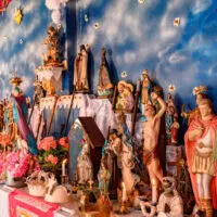 Brazilian religious altar mixing elements of Umbanda, Candomble, and Catholicism