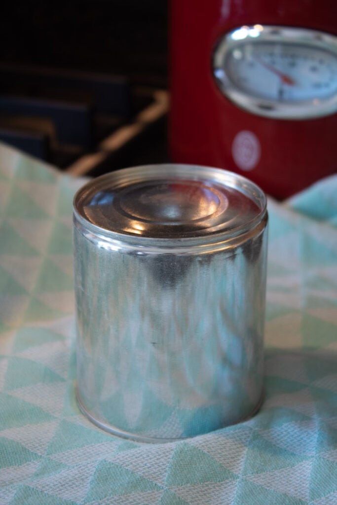 Cooked can of sweetened condensed milk for dulce de leche