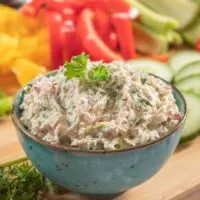 Sardine dip surrounded by vegetables