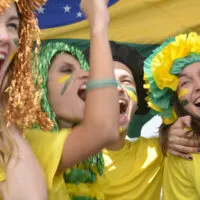 Group of happy Brazilian soccer fans