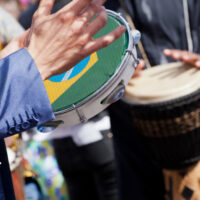 Playing samba on tambourine