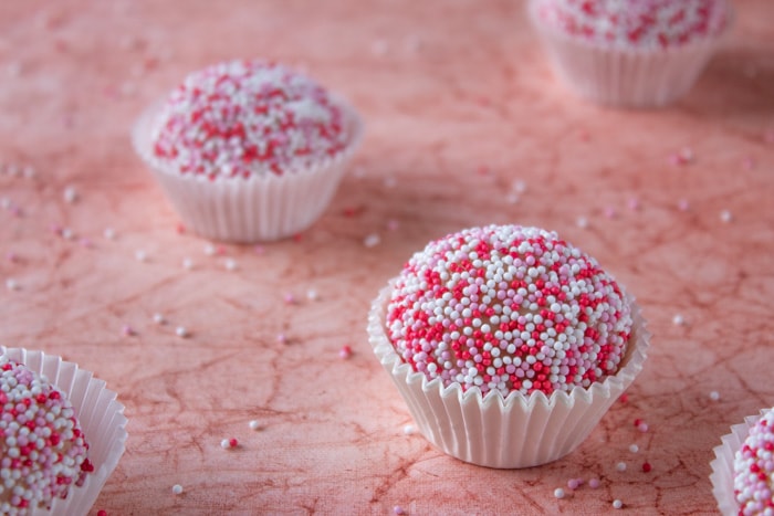 Strawberry brigadeiros on table