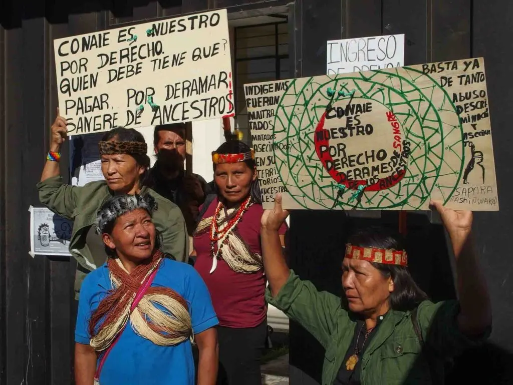 Amazonian Shuar women protesting against mining and oil drilling in the Amazon Rainforest