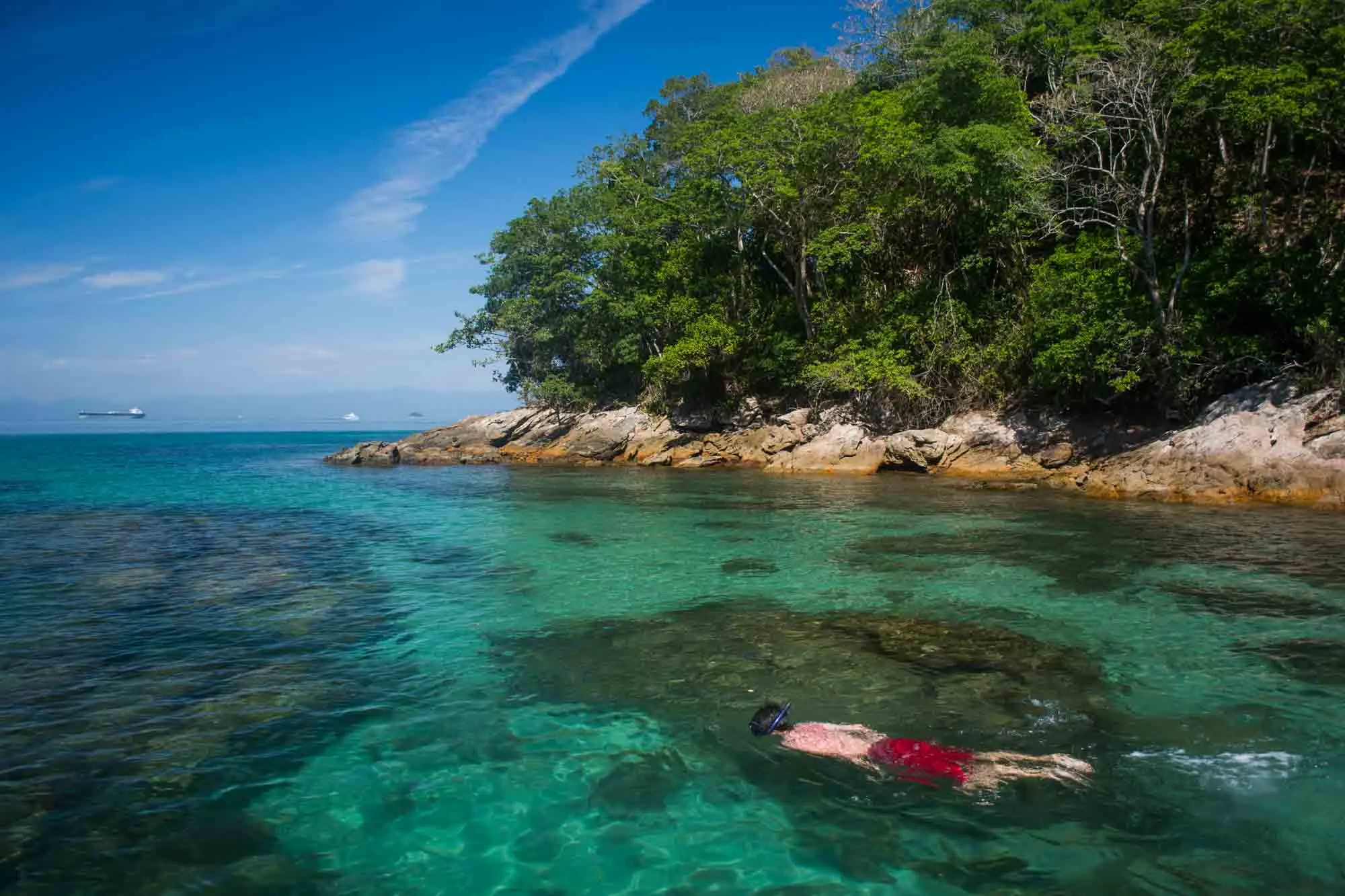 Person snorkeling in Lagoa Azul, Ilha Grande