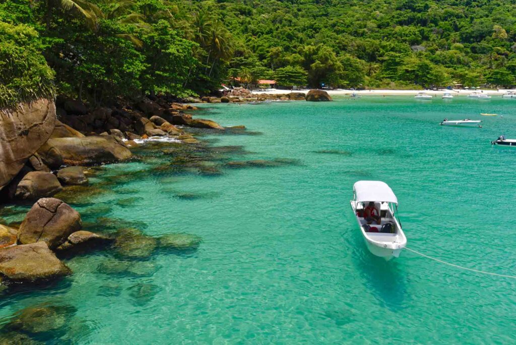 Boat on blue water of Ilha Grande, Brazil