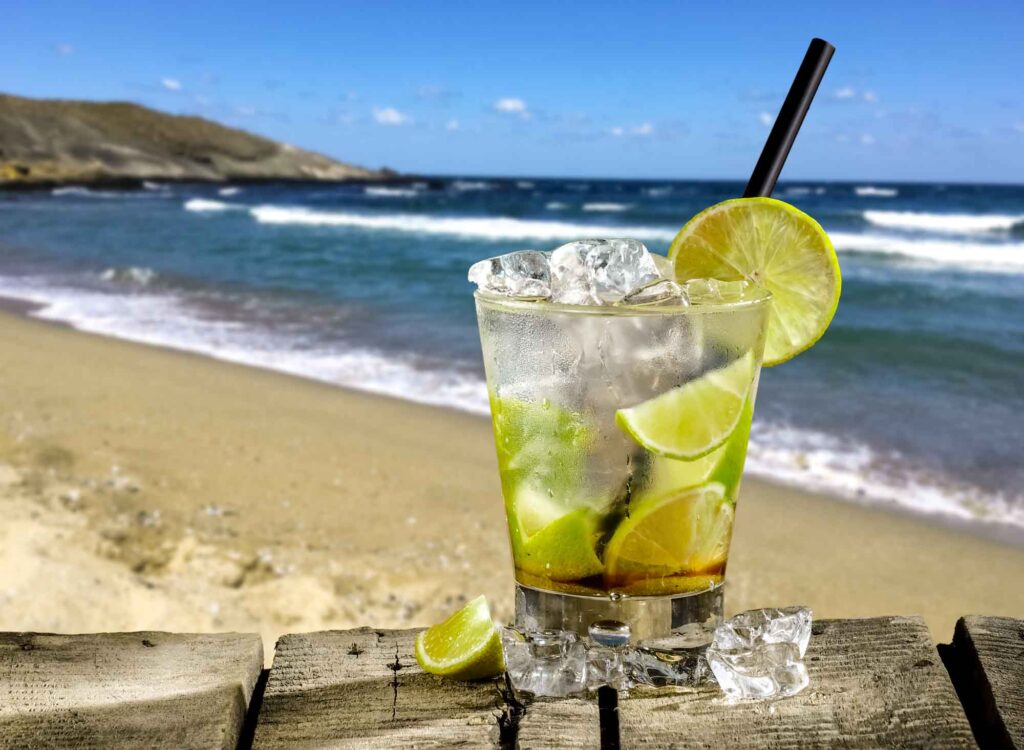 Caipirinha cocktail by the beach