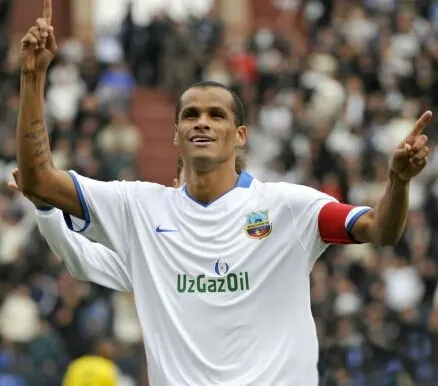 Rivaldo, a soccer player from Brazil, celebrating a goal