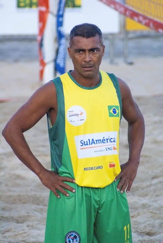 Romario, a soccer player from Brazil, playing footvolley